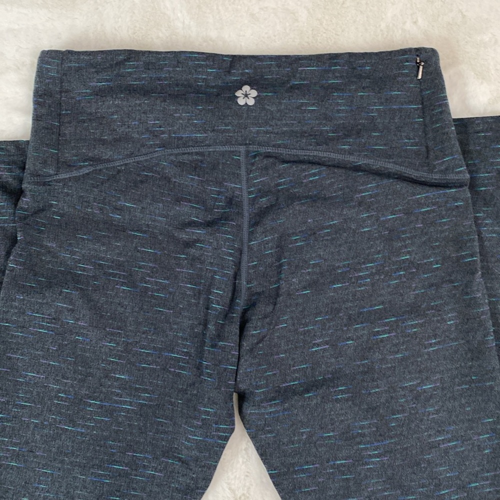 NWOT. Tuff Athletics size M. Women’s Leggings. Gray w/ Teal, Blue, Purple
